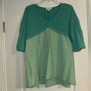 Oddi blue/green two tone color block v-neck tunic top with raw hem. Oversized